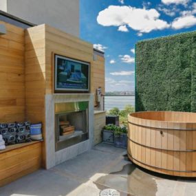 Urban Rooftop Oasis: Hot Tub, Fireplace and Theater